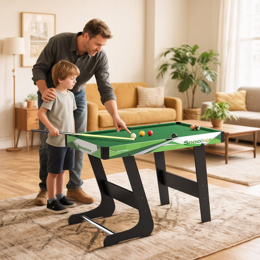 A father and son playing on the mini pool table in a bright living room setting