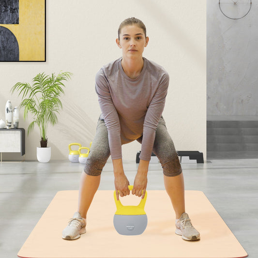 The soft kettlebell being used by a woman performing a squat in a home gym