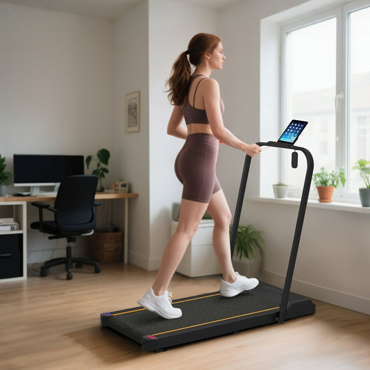 A woman walks on the folding treadmill in a home office setting