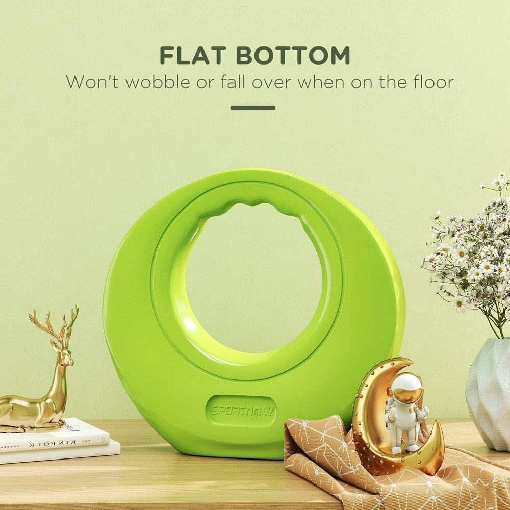 Green kettlebell with a flat bottom resting on a table