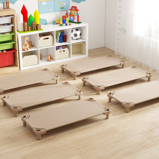 Stackable Kids Nap Cot, the toddler beds arranged on a wooden floor in a bright playroom setting