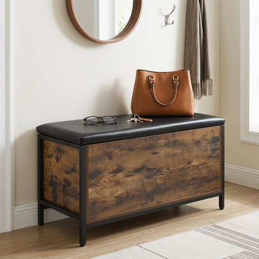 The storage bench placed in a hallway with a handbag and glasses on the seat