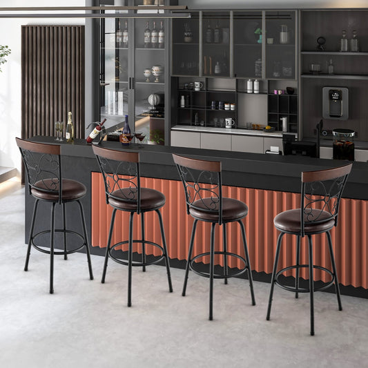 Four swivel bar stools arranged around a kitchen island