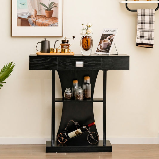 Black T-shaped console table with a drawer and shelves, styled with coffee making items and jars