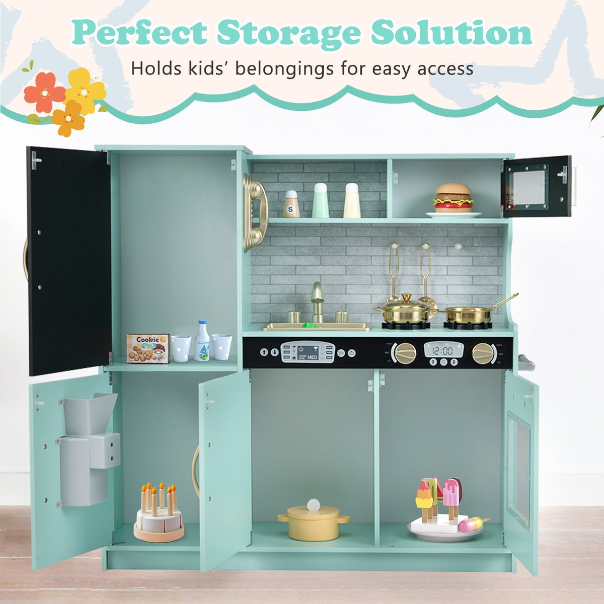 The green play kitchen set with doors open showing storage and accessories