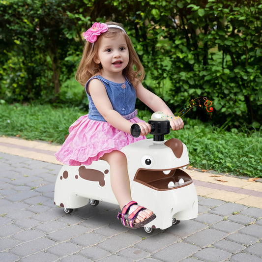 A young girl sitting on the white animal ride on toy while playing on a paved garden path