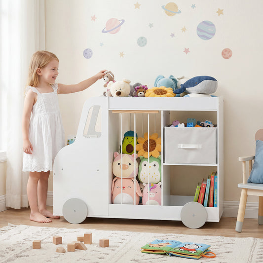 The kids storage unit standing in a nursery with a young girl placing a toy on the top shelf
