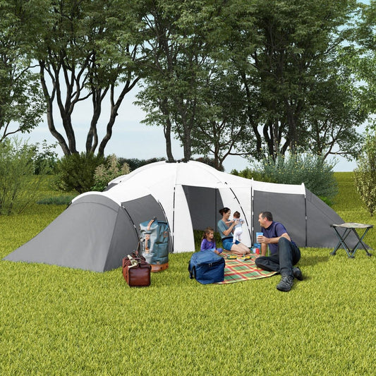 A family enjoying a picnic outside the large camping tent on a sunny day