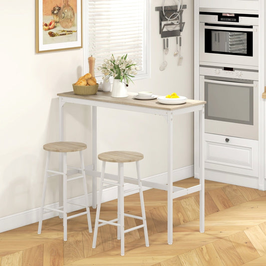 The dining furniture set placed in a bright kitchen with plates and a vase on the table surface