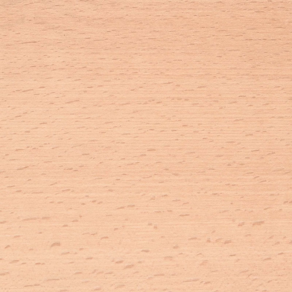 A close-up of the natural wood texture on the window sill surface