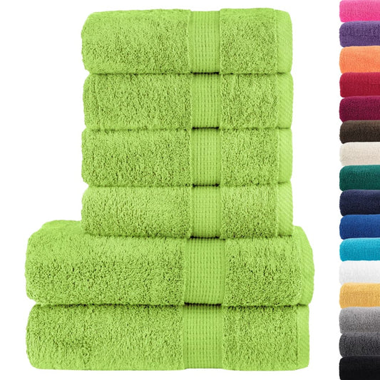 A stack of apple green towels with a selection of other colours available