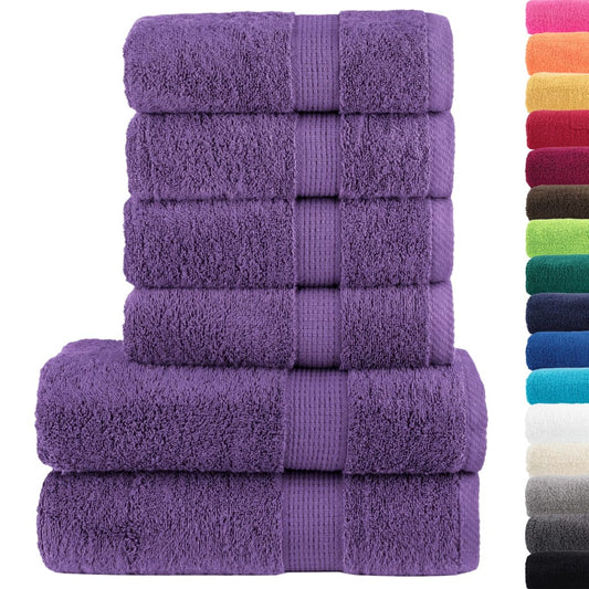 A stack of purple towels with other colours available in the background