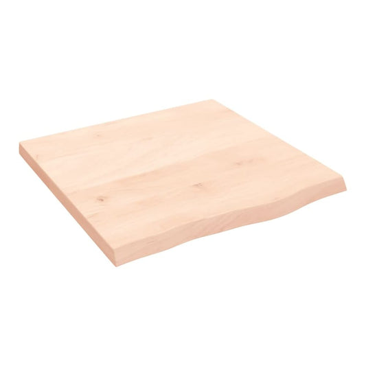 The untreated solid wood worktop shown from a high angle with a live edge detail