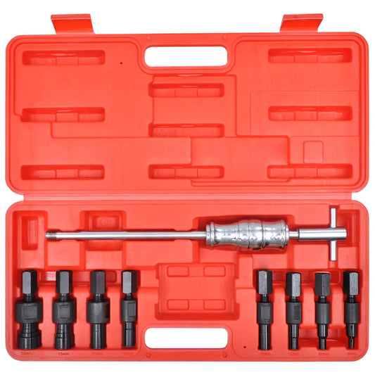 Close-up of the bearing puller tool set components laid out in a red case