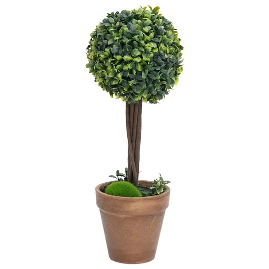 the artificial flora standing upright with a round topiary head in a terracotta pot