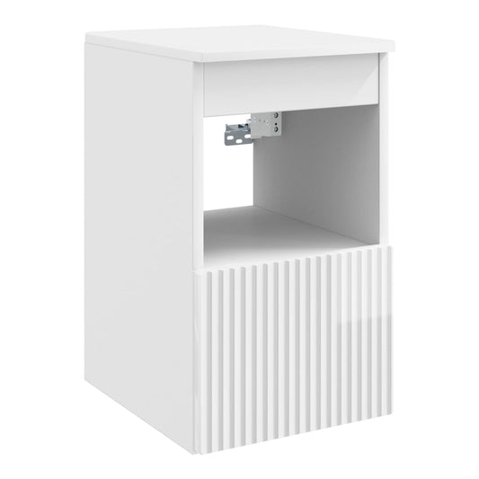 The bathroom vanity unit showing the open shelf and the textured lower cabinet door