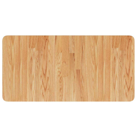 A light brown wooden countertop with a visible wood grain pattern, showing the full surface