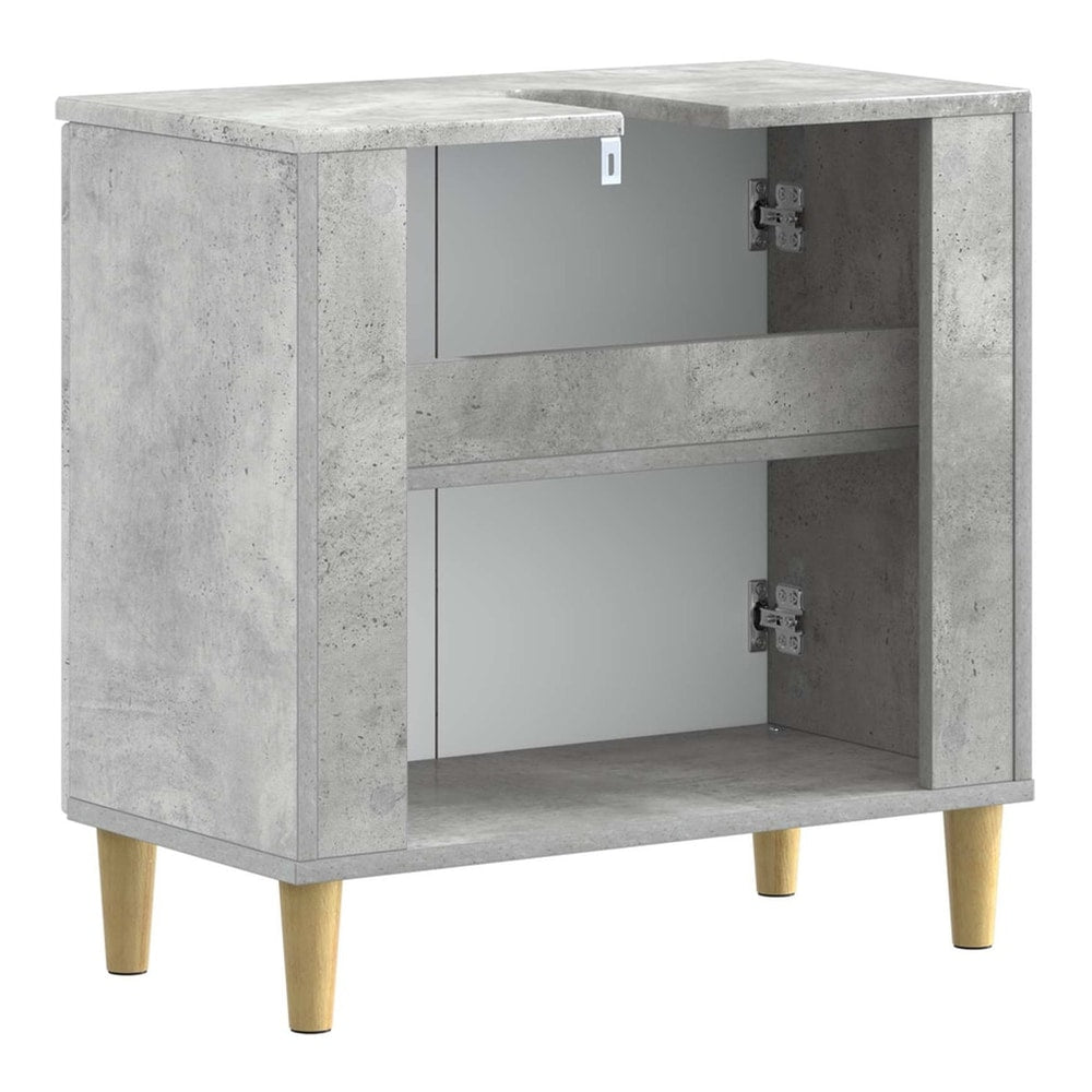 The open bathroom sink cabinet showing shelves and hinges