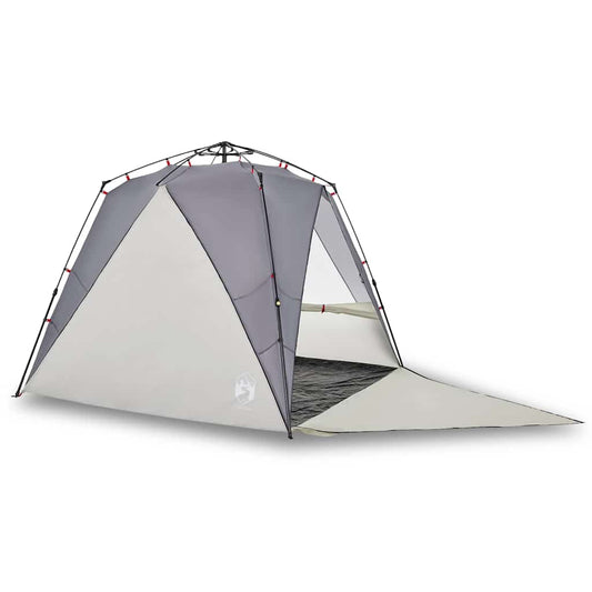 The grey beach tent is shown from a side angle with its floor extended