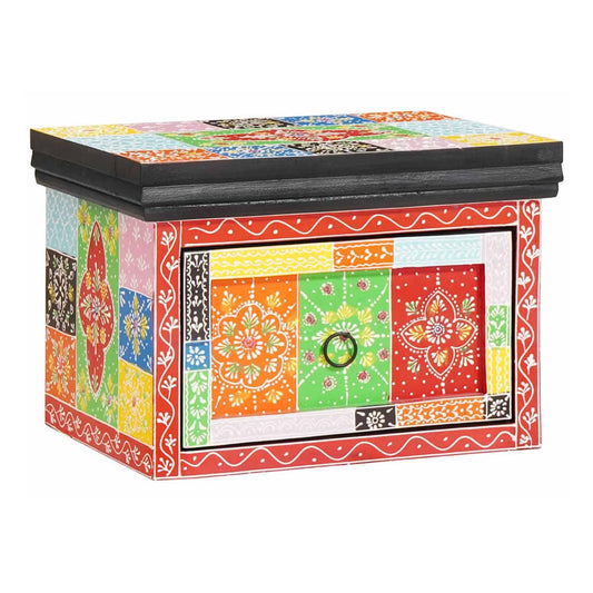 The bedside cabinet has a colourful patchwork design on the front and top