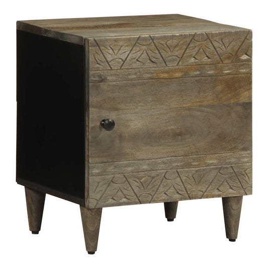 The bedside table with a light grey wooden door featuring carved patterns and a black side panel