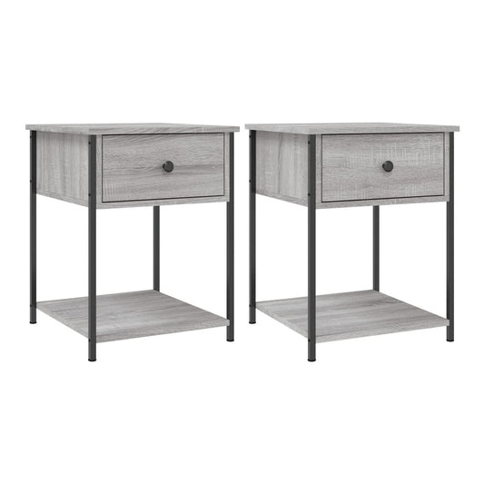 Two grey bedside tables with a drawer and a shelf