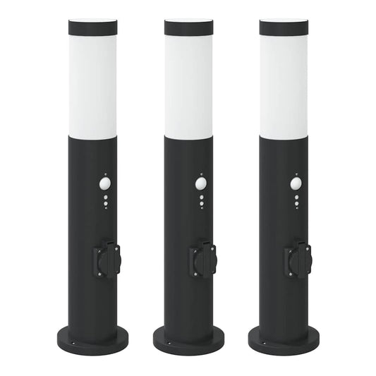 three black bollard lamps with white tops and outlets