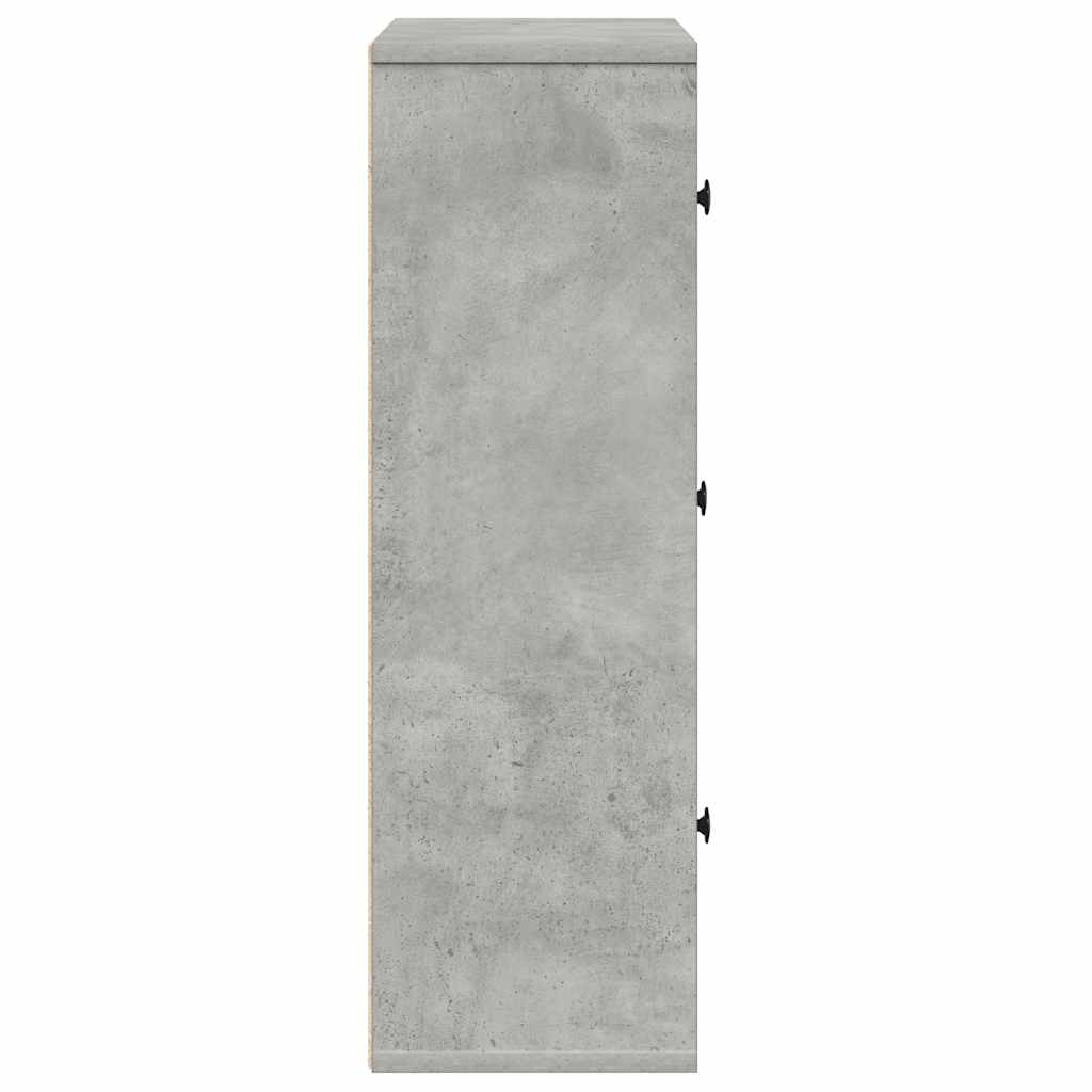 The side panel of the bookcase showing the smooth concrete grey surface