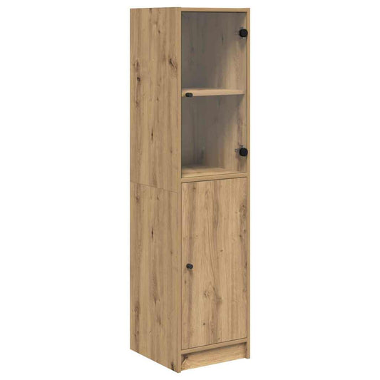 The tall storage unit with a glass upper door and a solid lower door in a light wood finish