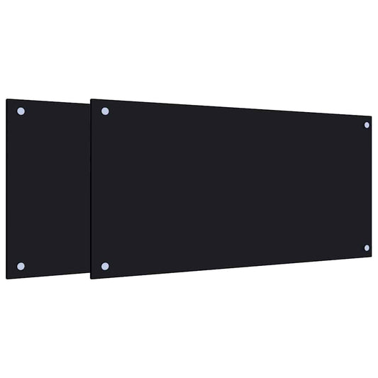 Two black glass kitchen backsplashes shown together