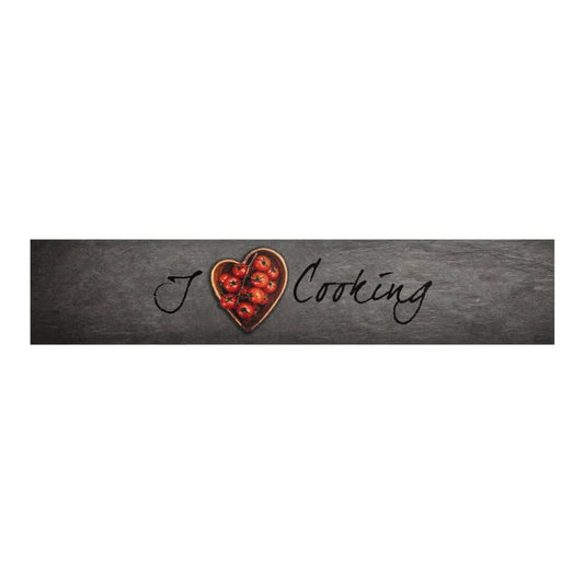 A long rectangular kitchen rug with a "I Cooking" text and a heart shape made of tomatoes