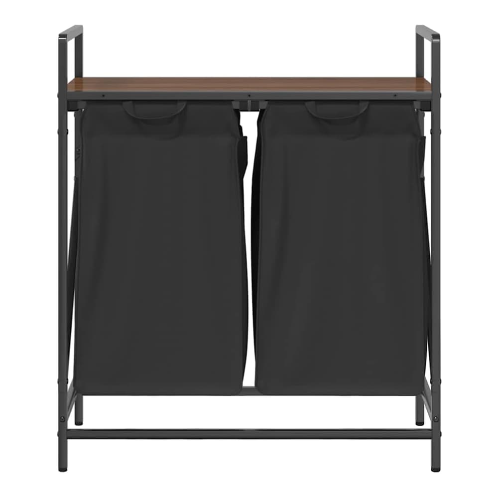 The laundry sorter with two compartments and a shelf, showing the top shelf and handles