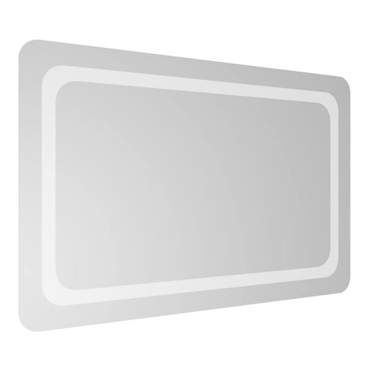 A rectangular bathroom mirror with a subtle illuminated border, angled to show its depth