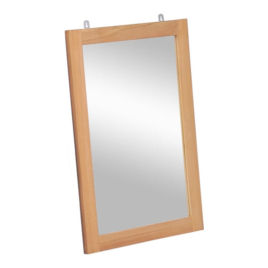 The wooden framed mirror tilted to the side, showing its depth