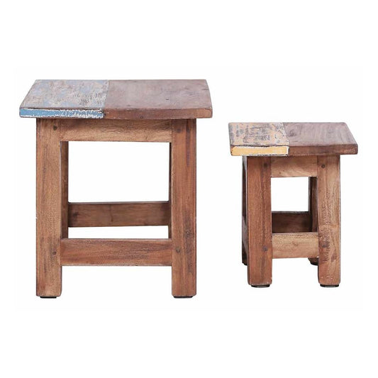 Two small solid mahogany wood nesting tables, one slightly taller than the other