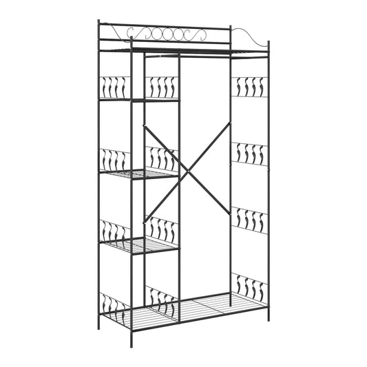 The open wardrobe frame with decorative scrollwork at the top and criss-cross support at the back