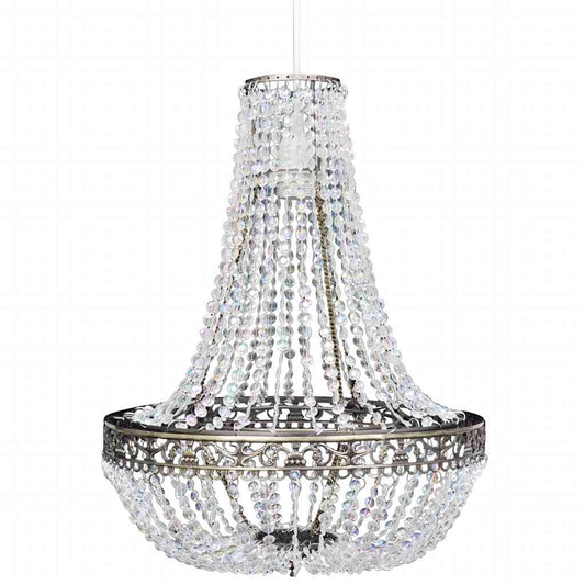 A close-up of the crystal beads and metal detailing on the chandelier