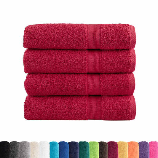 Four red towels shown with a range of other colours available for the bath towels