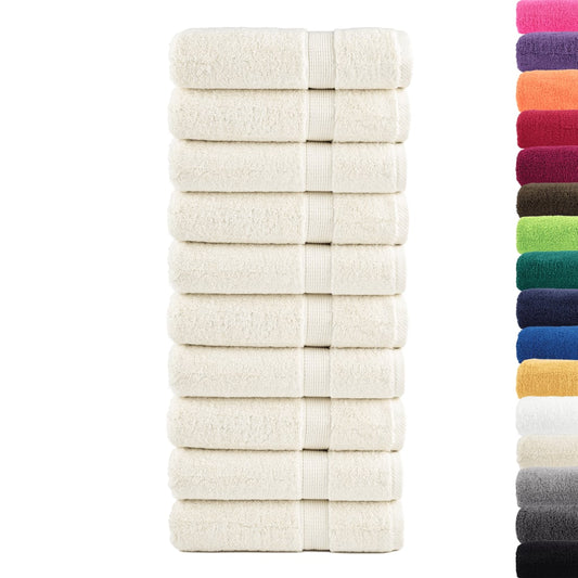 Cream hand towels shown with a selection of other colours available