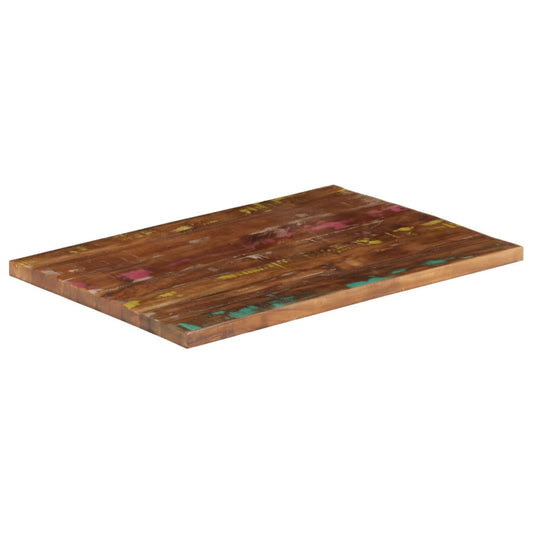The rectangular table top viewed from a high angle showing the thickness and wooden grain