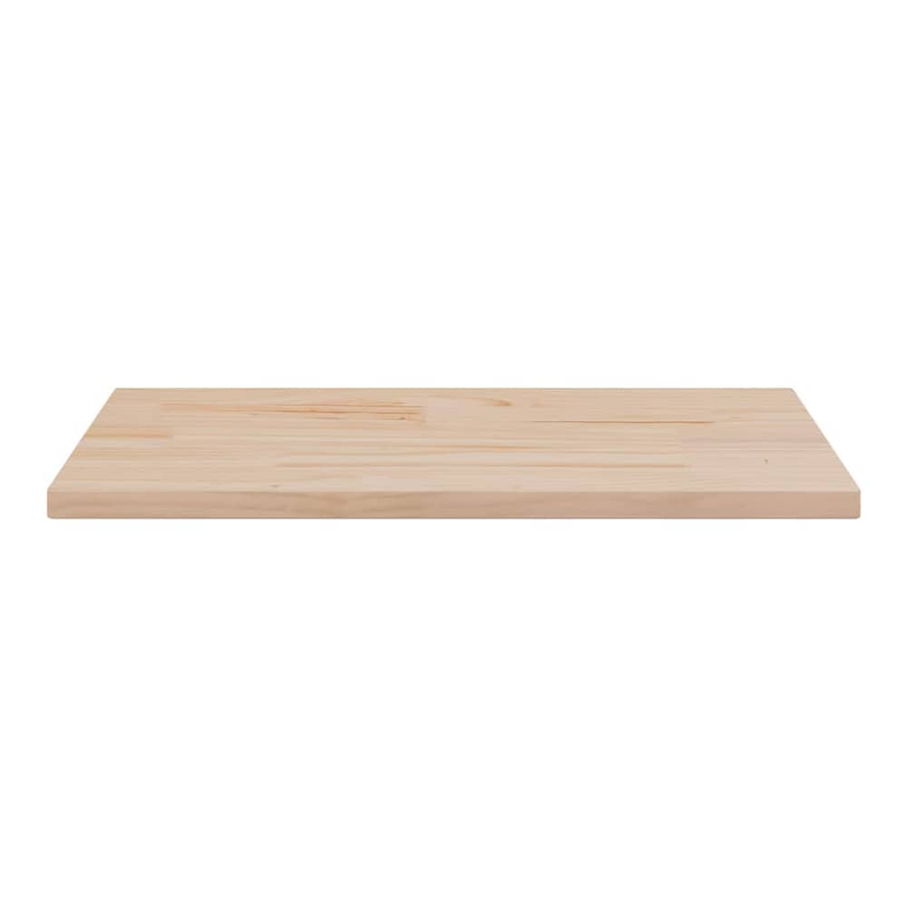 A single rectangular solid wood pine table top shown from the side