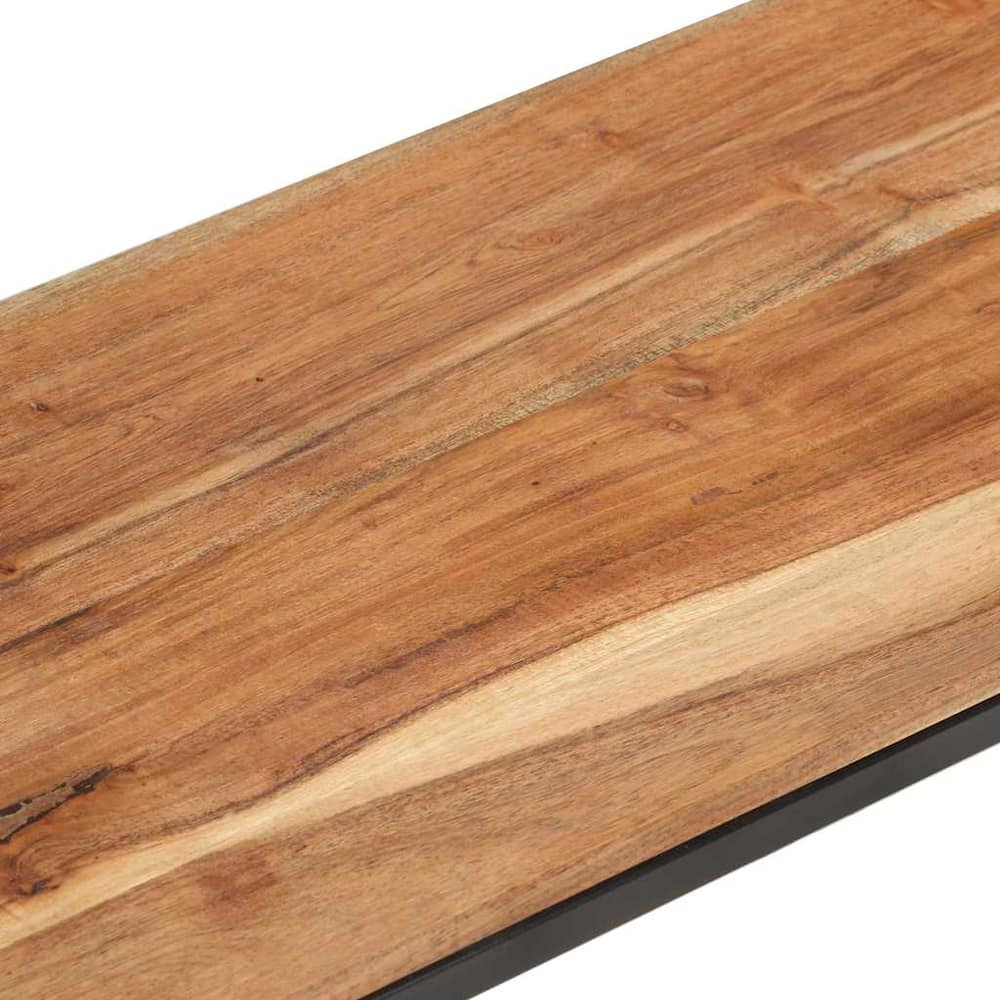 Close-up of the natural wood grain on the TV cabinet shelf