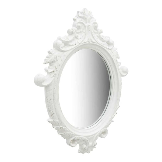 The ornate white frame of this castle style wall mirror has decorative scrollwork and leaf motifs