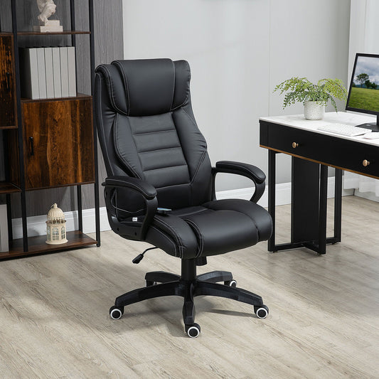 The black PU office chair is shown in a modern home office setting next to a desk