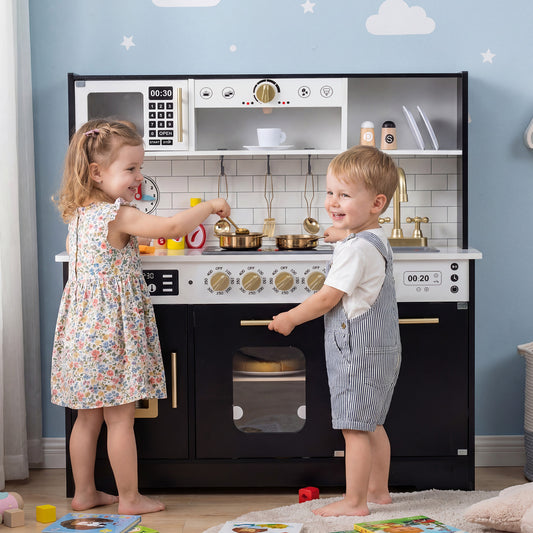 The play kitchen set is shown with two children playing with pots and pans