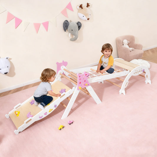 Two toddlers playing on the wooden climbing frame in a nursery room