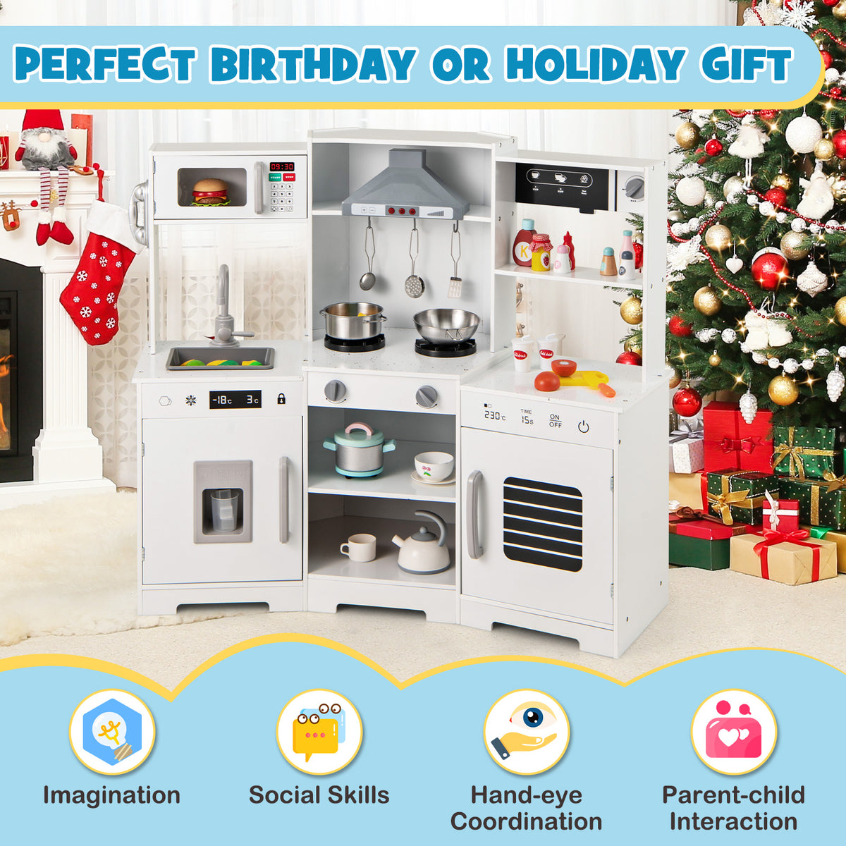 The white wooden play kitchen set up in a room with Christmas decorations