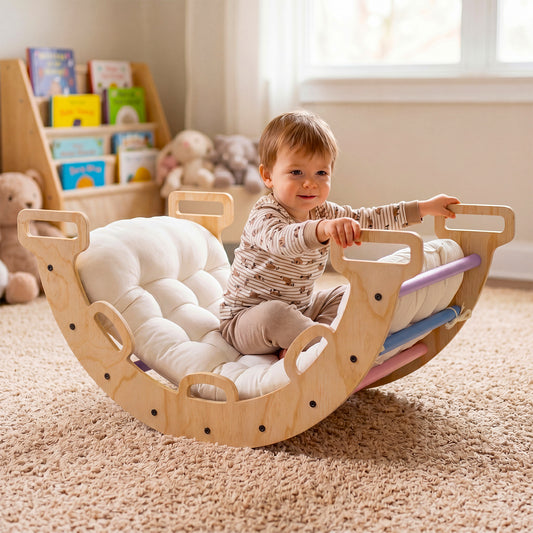 The climbing frame being used as a rocker by a toddler sitting on the cushioned base