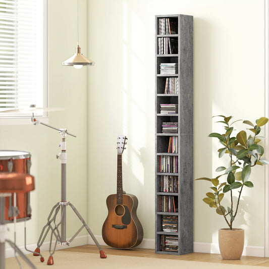 The tall narrow media storage unit in a room with a guitar and drums