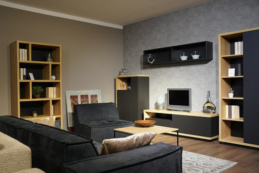 a living room filled with furniture and a flat screen tv